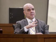 Robert Telles shows how he cut his finger while speaking to the jury from the witness stand on the eighth day of his murder trial at the Regional Justice Center in Las Vegas Wednesday, August 21, 2024. Telles, a former Clark County public administrator, is charged in the murder of Las Vegas Review-Journal investigative journalist Jeff German. (K.M.