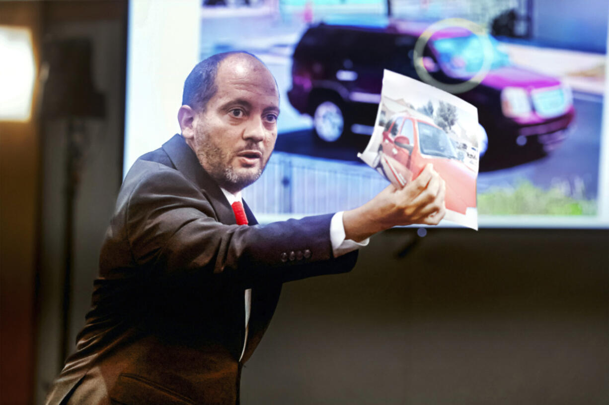 Chief Deputy District Attorney Christopher Hamner shows the jury similarities between the suspect&rsquo;s vehicle and Robert Telles&rsquo; vehicle on the third day of Telles&rsquo; murder trial, Wednesday, Aug. 14, 2024. (K.M.