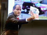 Chief Deputy District Attorney Christopher Hamner shows the jury similarities between the suspect&rsquo;s vehicle and Robert Telles&rsquo; vehicle on the third day of Telles&rsquo; murder trial, Wednesday, Aug. 14, 2024. (K.M.