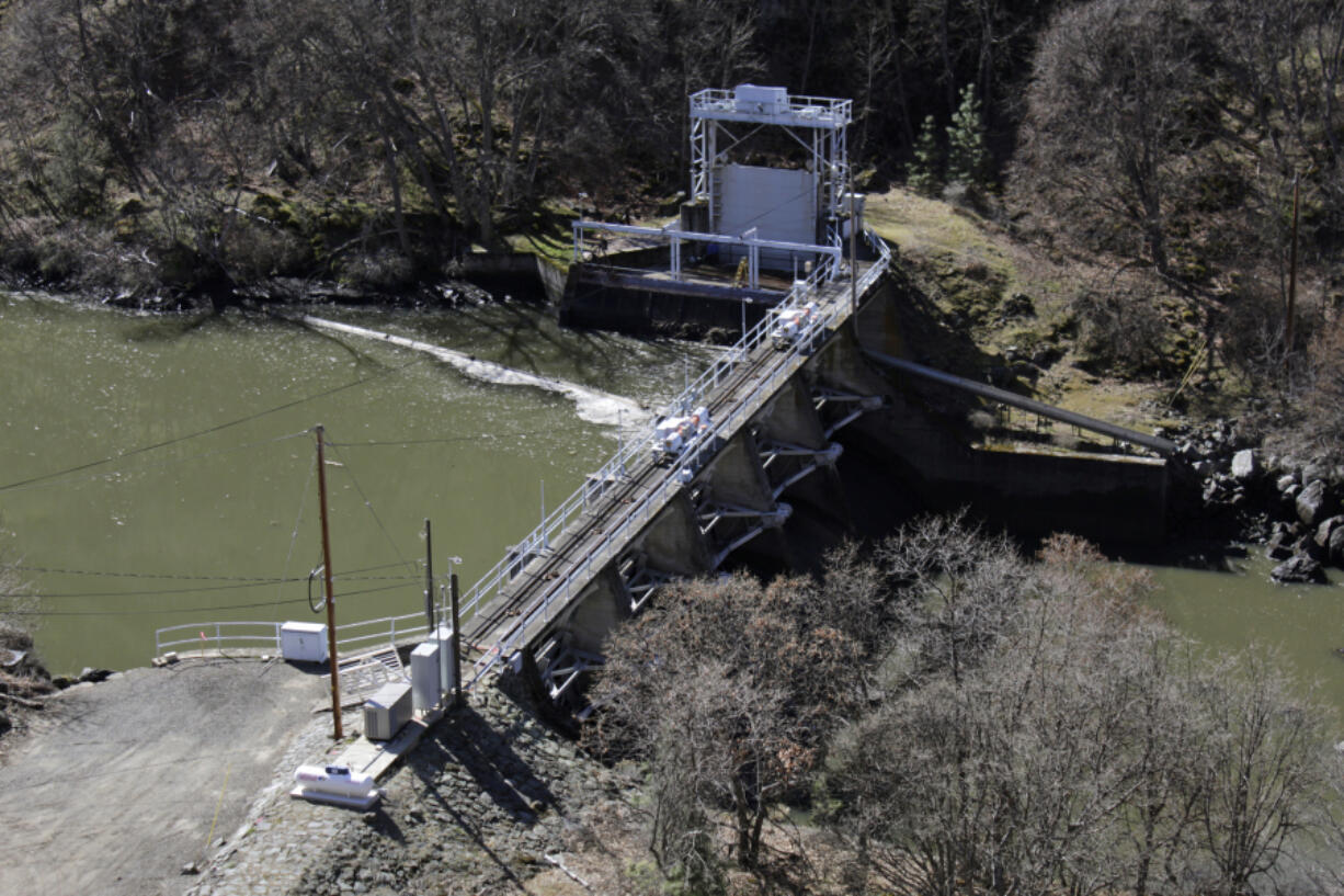 FILE - A dam on the lower Klamath River known as Copco 2 is seen near Hornbrook, Calif., on March 3, 2020.