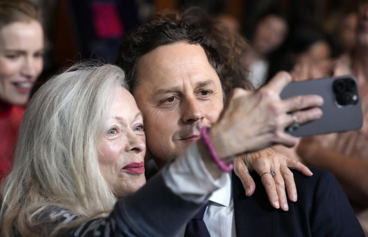 Giovanni Ribisi, right, director of photography on &ldquo;Strange Darling,&rdquo; poses for a selfie with actor Frances Fisher at the premiere of the film at the Directors Guild of America, Monday, Aug. 19, 2024, in Los Angeles.