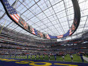 FILE - National anthem wide angle cheerleaders Los Angeles Rams SoFi Stadium of an NFL football game against the Pittsburgh Steelers, Sunday, Oct. 22, 2023, in Inglewood, Calif. As the Olympics close in Paris, Los Angeles will take the torch.