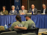 FILE &mdash; Members of the independent commission investigating the law enforcement response to the mass shooting in Lewiston, Maine, listen as Nicole Herling, below left, sister of shooter Robert Card, testifies Thursday, May 16, 2024, in Augusta, Maine. (AP Photo/Robert F.