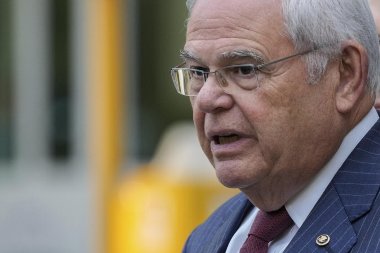 FILE - Sen. Bob Menendez, D-N.J., speaks to the media outside federal court, after being convicted of all the federal charges he faced at his corruption trial, Tuesday, July 16, 2024, in New York.