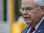 FILE - Sen. Bob Menendez, D-N.J., speaks to the media outside federal court, after being convicted of all the federal charges he faced at his corruption trial, Tuesday, July 16, 2024, in New York.