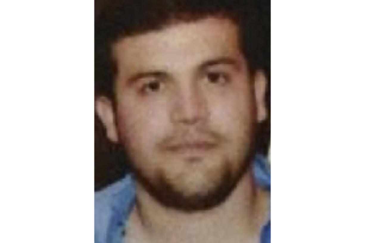 FILE - This image provided by the U.S. Department of State shows Joaqu&iacute;n Guzm&aacute;n L&oacute;pez, the son of an infamous cartel leader, who was arrested by U.S. authorities in Texas. On Tuesday, July 30, 2024, L&oacute;pez, pleaded not guilty to drug trafficking and other charges in Chicago. (U.S.