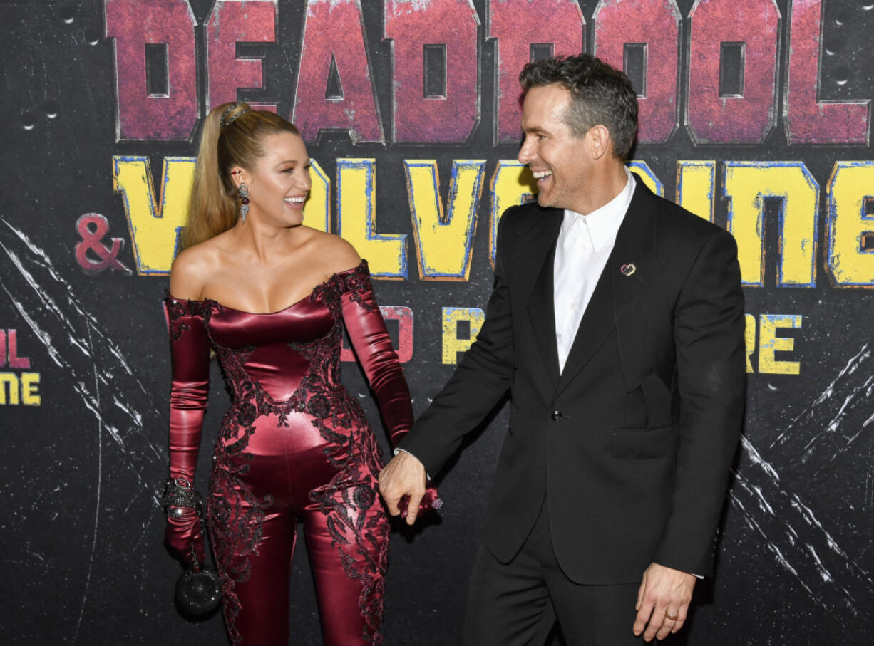 Blake Lively, left, and Ryan Reynolds attend the world premiere of Marvel Studios&rsquo; &ldquo;Deadpool &amp; Wolverine&rdquo; at the David H. Koch Theater on Monday, July 22, 2024, in New York.