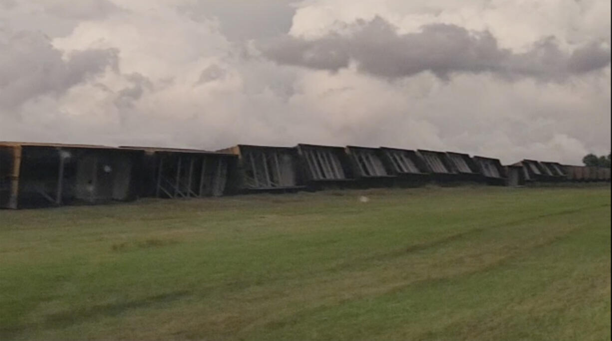 Railroad cars are knocked off the tracks due to high winds Wednesday night, near Steele, N.D., on Thursday, Aug. 29, 2024.