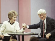 Talk show host Phil Donahue appears with former first lady Nancy Reagan during taping of his show to promote her book &ldquo;My Turn&rdquo; on Nov. 6, 1989, in Burbank, Calif. Donahue, whose pioneering daytime talk show launched an indelible television genre, died Sunday. He was 88.