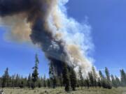 FILE - In this photo provided by the Deschutes County Sherriff&rsquo;s Office, smoke rises from a wildfire near La Pine, Ore., Tuesday, June 25, 2024. (Sgt.