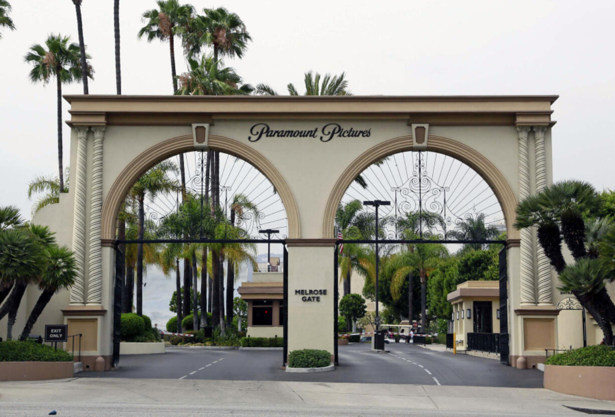 FILE - The main gate to Paramount Studios is seen on Melrose Avenue, July 8, 2015, in Los Angeles.