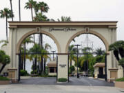 FILE - The main gate to Paramount Studios is seen on Melrose Avenue, July 8, 2015, in Los Angeles.