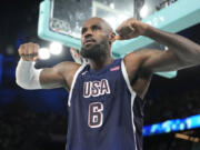 United States&rsquo; LeBron James flexes after scoring during a men&rsquo;s basketball game against Brazil at the 2024 Summer Olympics, Tuesday, Aug. 6, 2024, in Paris, France.