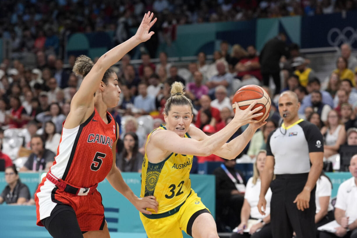 Australia&rsquo;s Sami Whitcomb, right, drives toward the basket as Canada&rsquo;s Kia Nurse defends during a women&rsquo;s basketball game at the 2024 Summer Olympics, Thursday, Aug. 1, 2024, in Villeneuve-d&rsquo;Ascq, France.