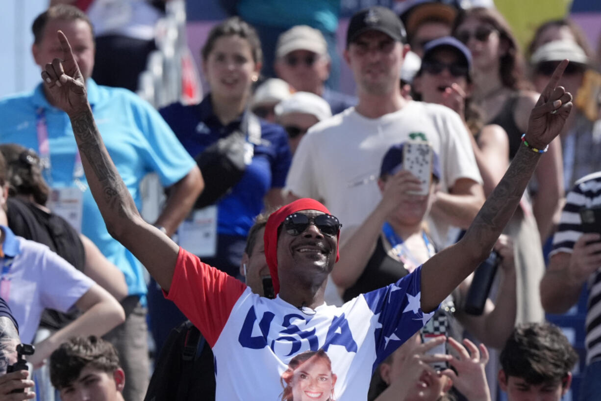 US artist Snoop Dogg attends a women&rsquo;s beach volleyball match between The United States and France at the 2024 Summer Olympics, Wednesday, July 31, 2024, in Paris, France. (AP Photo/Robert F.