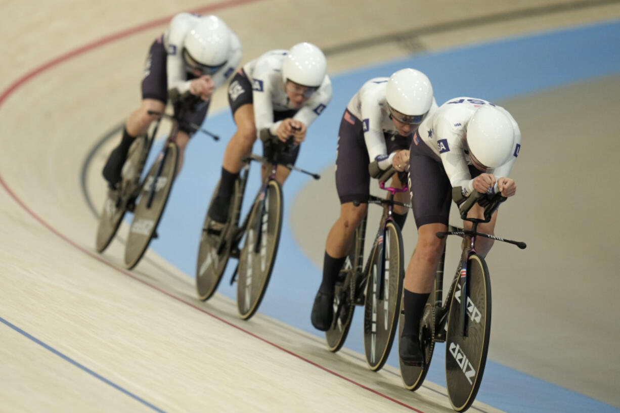 United States&#039; Jennifer Valente, Lily Williams, Chloe Dygert and Kristen Faulkner compete on their way to clinch the gold medal in the women&#039;s team pursuit event, at the Summer Olympics, Wednesday, Aug. 7, 2024, in Paris, France.