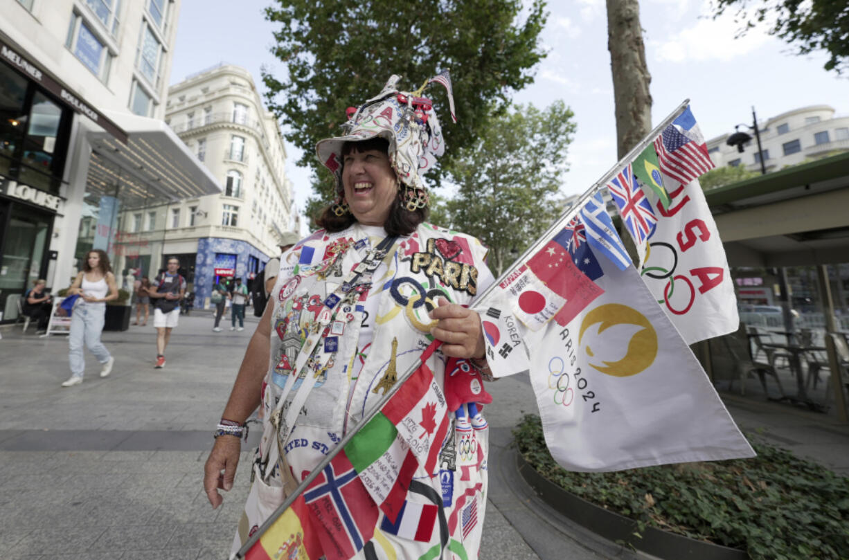 Vivianne Robinson poses July 30 during 2024 Summer Olympics, in Paris. The Olympics superfan has attended seven Games over the span of 40 years.