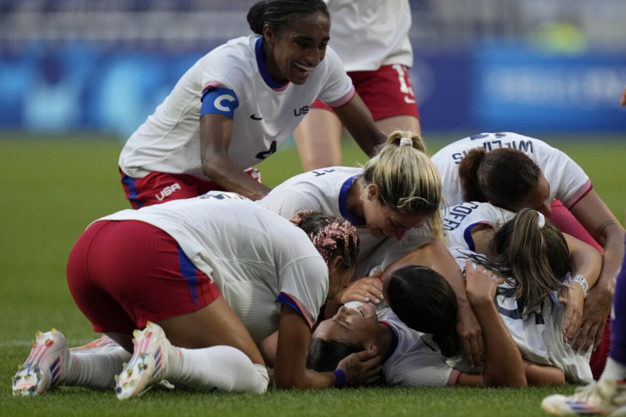 United States&rsquo; Sophia Smith celebrates with team mates the opening goal during a women&rsquo;s semifinal soccer match between the United States and Germany at the 2024 Summer Olympics, Tuesday, Aug. 6, 2024, at Lyon Stadium in Decines, France.