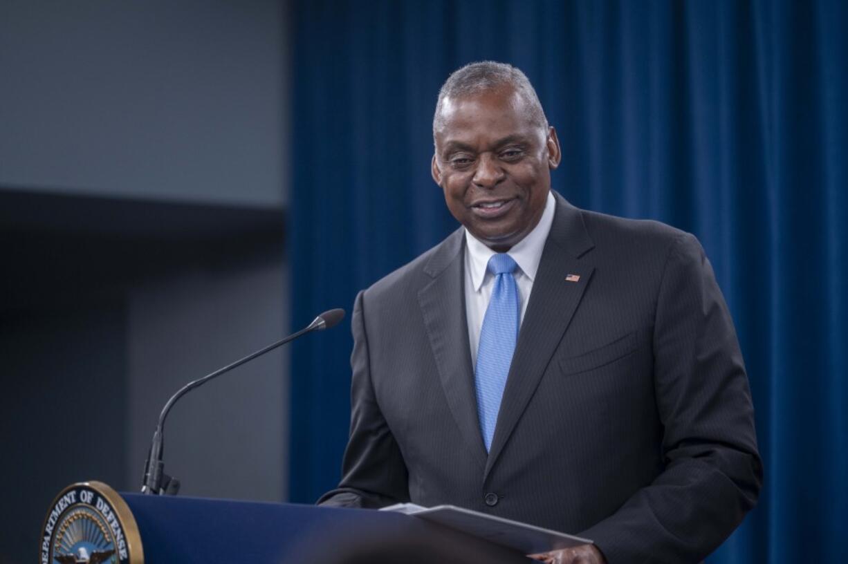 Secretary of Defense Lloyd Austin smiles while answering a question during a press briefing at the Pentagon on Thursday, July 25, 2024 in Washington.