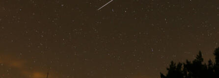 In this long-exposure photo, a streak appears in the sky during the annual Perseid meteor shower at the Guadarrama mountains, near Madrid, in the early hours of Aug. 12, 2016.