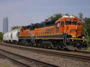 FILE - A BNSF locomotive heads south out of Oklahoma City, Sept. 14, 2022.