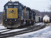 FILE - CSX locomotives sit at CSX North Framingham Yard, on Jan. 24, 2023, in Framingham, Mass.