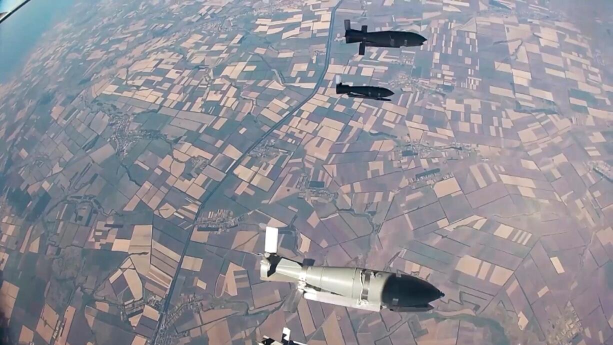 FILE - In this photo taken from video released by the Russian Defense Ministry on Aug. 21, 2024, glide bombs released by a Russian warplane are seen en route to targets amid an incursion by Ukrainian forces into Russia&rsquo;s Kursk region.