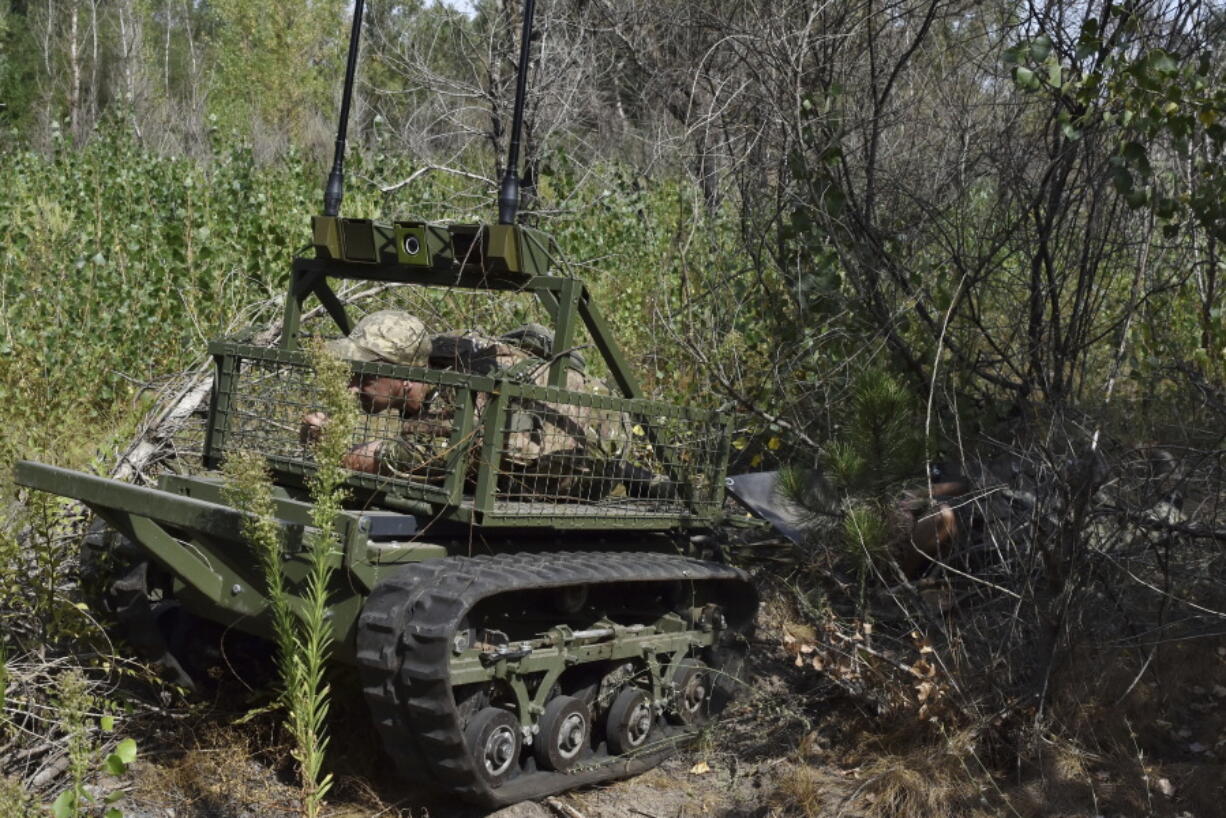 Ukrainian soldiers of 65th brigade practice medical evacuations using an all-terrain drone &ldquo;Vepryk&rdquo; in Zaporizhzhia region, Ukraine, Wednesday, Aug. 28, 2024.