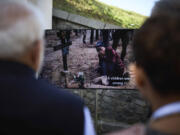 In this photo provided by the Ukrainian Presidential Press Office, shows Indian Prime Minister Narendra Modi, left, and Ukrainian President Volodymyr Zelenskyy during their visit to the memorial commemorating hundreds of Ukrainian children who were killed over more than two years of the war in Kyiv, Ukraine, Friday, Aug. 23, 2024.