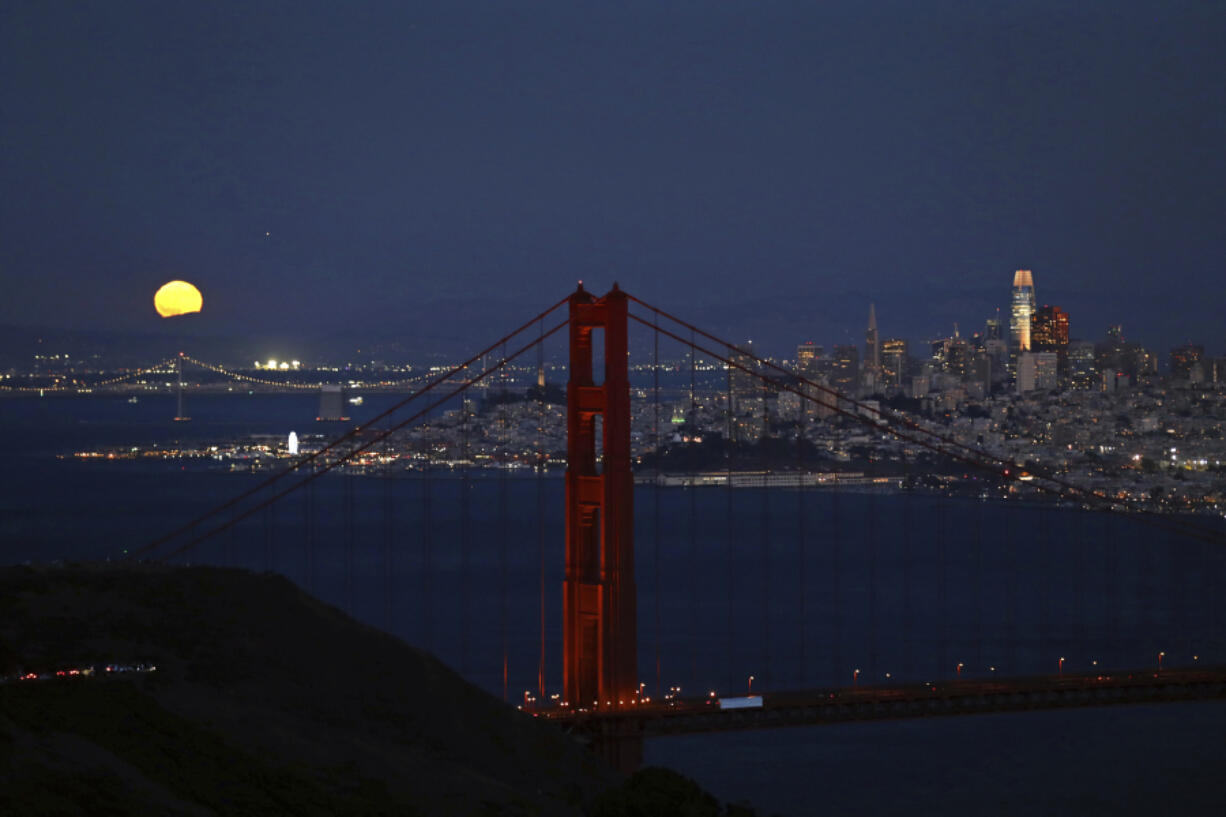 A supermoon is seen over San Francisco from Marin Headlands in Sausalito, Calif., on Monday, Aug. 19, 2024.