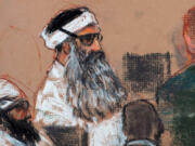 FILE - This Monday, Dec. 8, 2008 courtroom drawing by artist Janet Hamlin and reviewed by the U.S. military, shows Khalid Sheikh Mohammed, center, and co-defendant Walid Bin Attash, left, attending a pre-trial session at Guantanamo Bay Naval Base, Cuba. The man accused of being the main plotter in al-Qaeda&#039;s Sept. 11, 2001 attacks has agreed to plead guilty, The Defense Department said Wednesday.