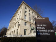 FILE - A sign stands outside the Federal Trade Commission building, Jan. 28, 2015, in Washington.