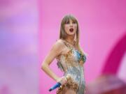 FILE - Taylor Swift performs at Wembley Stadium as part of her Eras Tour, June 21, 2024, in London.