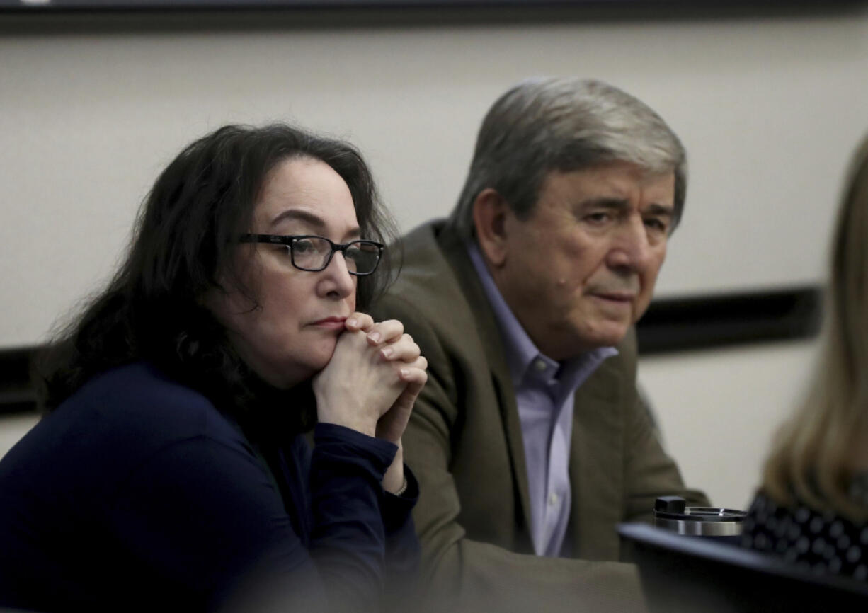 Rose Marie Kosmetatos, left, and her husband, Antonios Pagourtzis, parents of accused Santa Fe High School shooter Dimitrios Pagourtzis, listen to their attorneys discuss a motion Friday, Aug. 16, 2024, during their civil trial in Galveston County Court No. 3 Judge Jack Ewing&rsquo;s courtroom at the Galveston County Courthouse in Galveston, Texas.