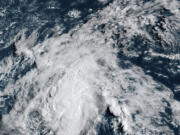 This satellite image shows Hurricane Hone passing south of Hawaii on Sunday.