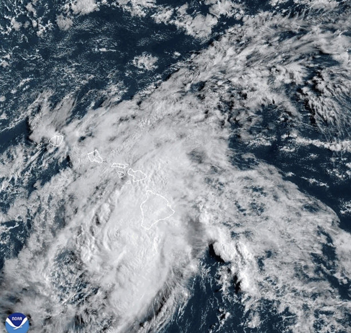 This Aug. 25, 2024 satellite image provided by the National Oceanic and Atmospheric Administration shows Hurricane Hone passing south of Hawaii.