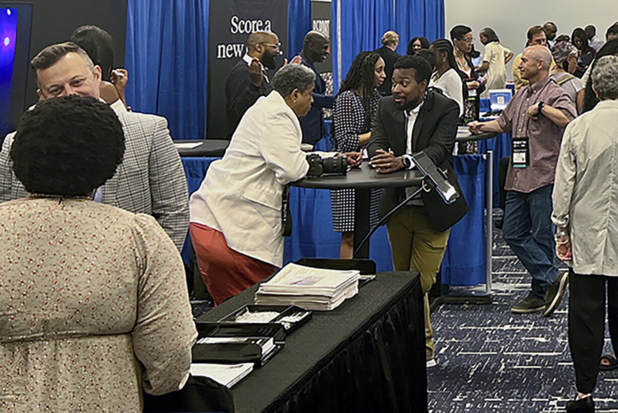 Panelists, recruiters and attendees, network and discuss changes in the industry among other media professionals at the Hilton Chicago, Thursday, August 1, 2024, at the 2024 National Association of Black Journalists convention in Chicago.