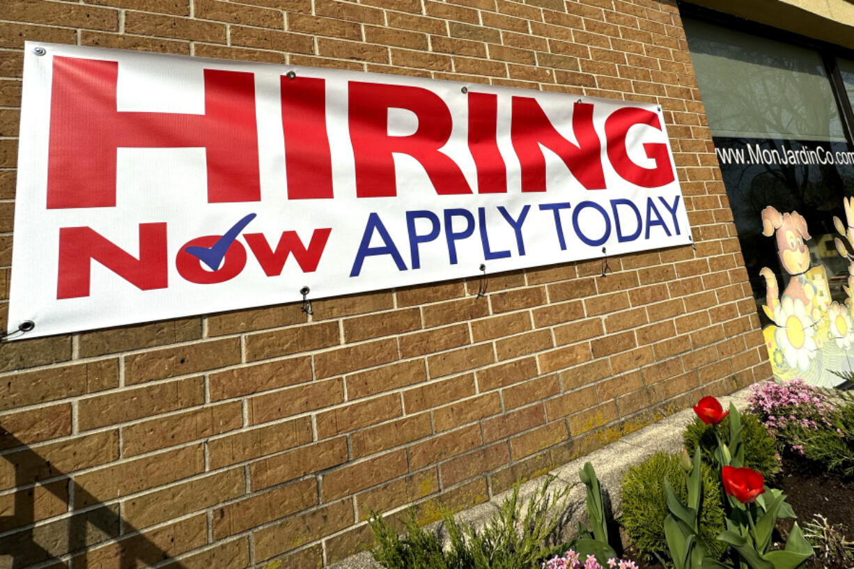 File - A hiring sign is displayed in Riverwoods, Ill., on April 16, 2024. (AP Photo/Nam Y.