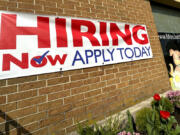 File - A hiring sign is displayed in Riverwoods, Ill., on April 16, 2024. (AP Photo/Nam Y.