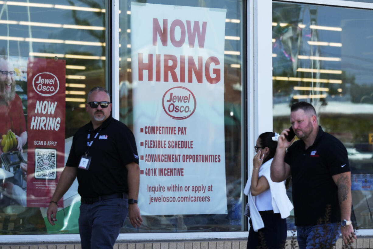 FILE - A hiring sign is displayed at a grocery store in Deerfield, Ill., Thursday, July 25, 2024. On Thursday, Aug. 1, 2024, the Labor Department reports on the number of people who applied for unemployment benefits last week. (AP Photo/Nam Y.