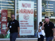 FILE - A hiring sign is displayed at a grocery store in Deerfield, Ill., Thursday, July 25, 2024. On Thursday, Aug. 1, 2024, the Labor Department reports on the number of people who applied for unemployment benefits last week. (AP Photo/Nam Y.