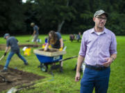 Jack Gary, Colonial Williamsburg&rsquo;s executive director of archaeology, speaks July 31 at the excavation site of an 18th century ornamental garden in Williamsburg, Va.