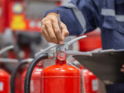 Clark County Fire District 6 is warning residents that scammers are pretending to be agency staff and charging $25 for fire extinguisher inspections.