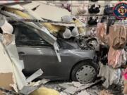 A car crashed into the JCPenney at the Spokane Valley Mall on Wednesday. The driver was reportedly in a mental health crisis.