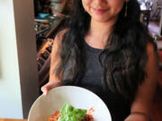 Pittsburgh Post-Gazette intern Kinnia Cheuk with a one-pot spaghetti she made in food editor Gretchen McKay&rsquo;s kitchen.