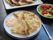 Tuck ground beef and cheese into a flour tortilla for an easy cheeseburger quesadilla.