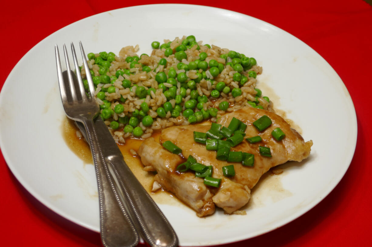 Japanese Style Butter Shoyu Chicken with Rice and Peas.