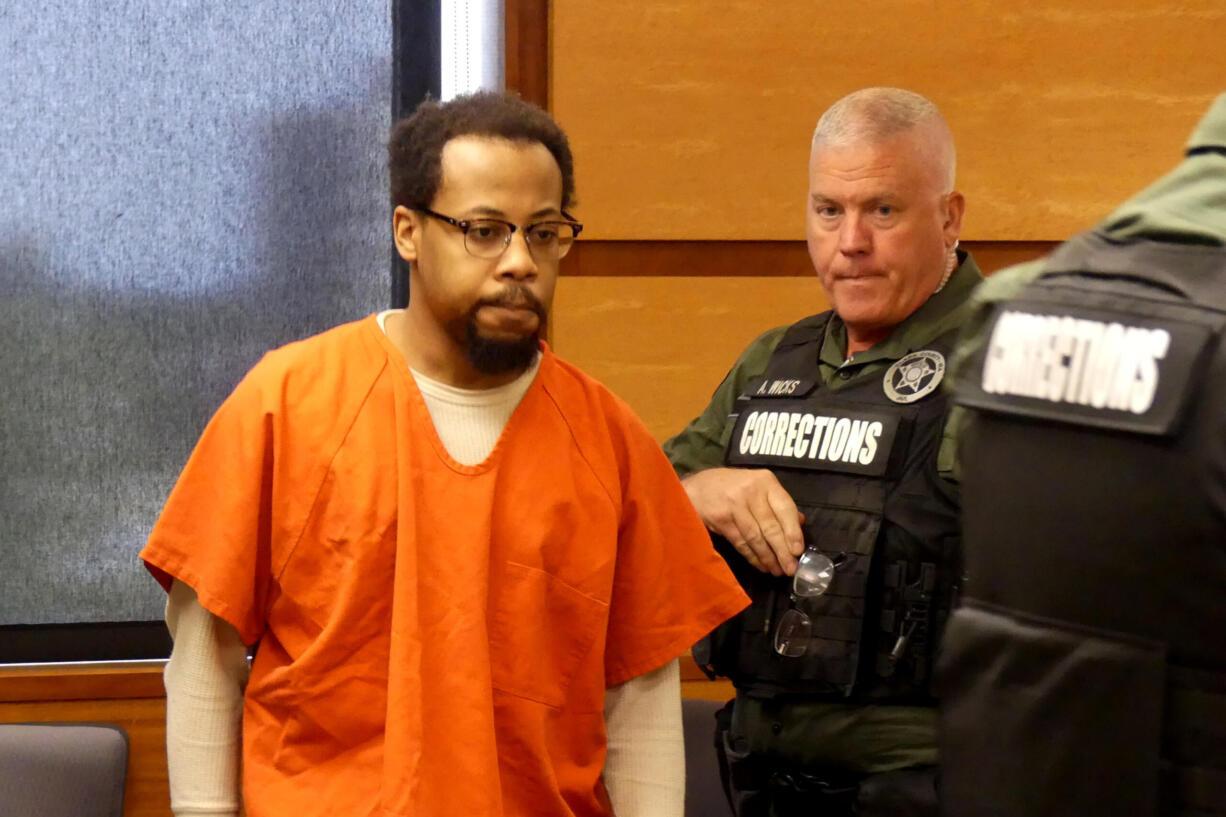 Kirkland Warren, 28, arrives for a change of plea hearing in his aggravated murder case Thursday in Clark County Superior Court. Warren pleaded guilty to second-degree murder and aggravated first-degree murder in the deaths of his former girlfriend, 27-year-old Meshay Melendez, and her 7-year-old daughter, Layla Stewart, respectively.