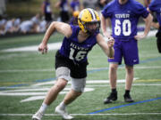 Senior Preston Shearer goes through drills during a preseason practice at Columbia River High School on Thursday, Aug. 22, 2024.