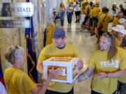 Idahoans for Open Primaries, a coalition backing an initiative to create an open primary and ranked choice voting in Idaho, deliver boxes from every county filled with signatures to deliver to the Idaho Secretary of State&rsquo;s Office in July.